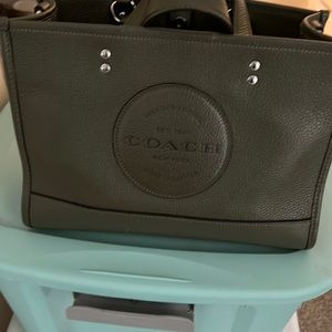 Used Coach Dempsey tote. Asking $100 /OBO